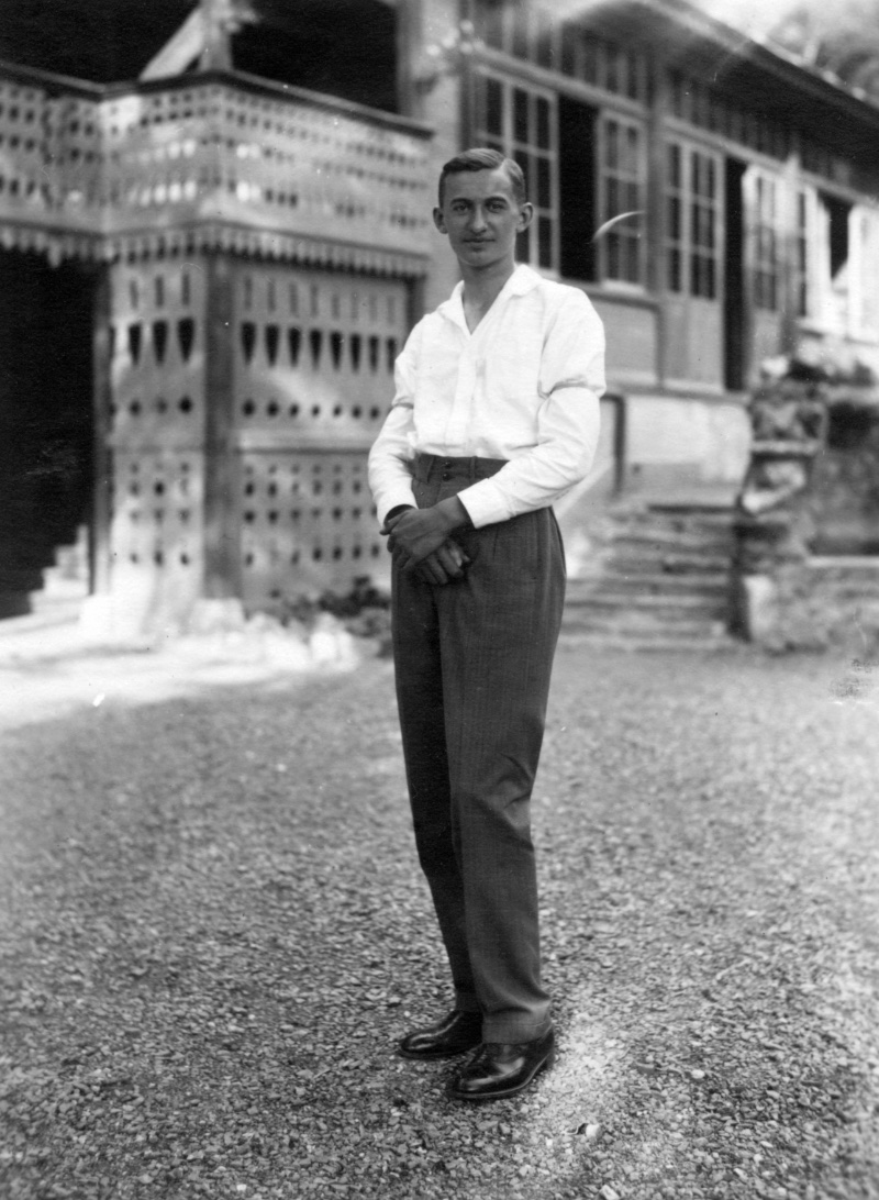 1920s Man Sleeve Garter A young 1920s man wears a white shirt with the popular sleeve garters of the era.