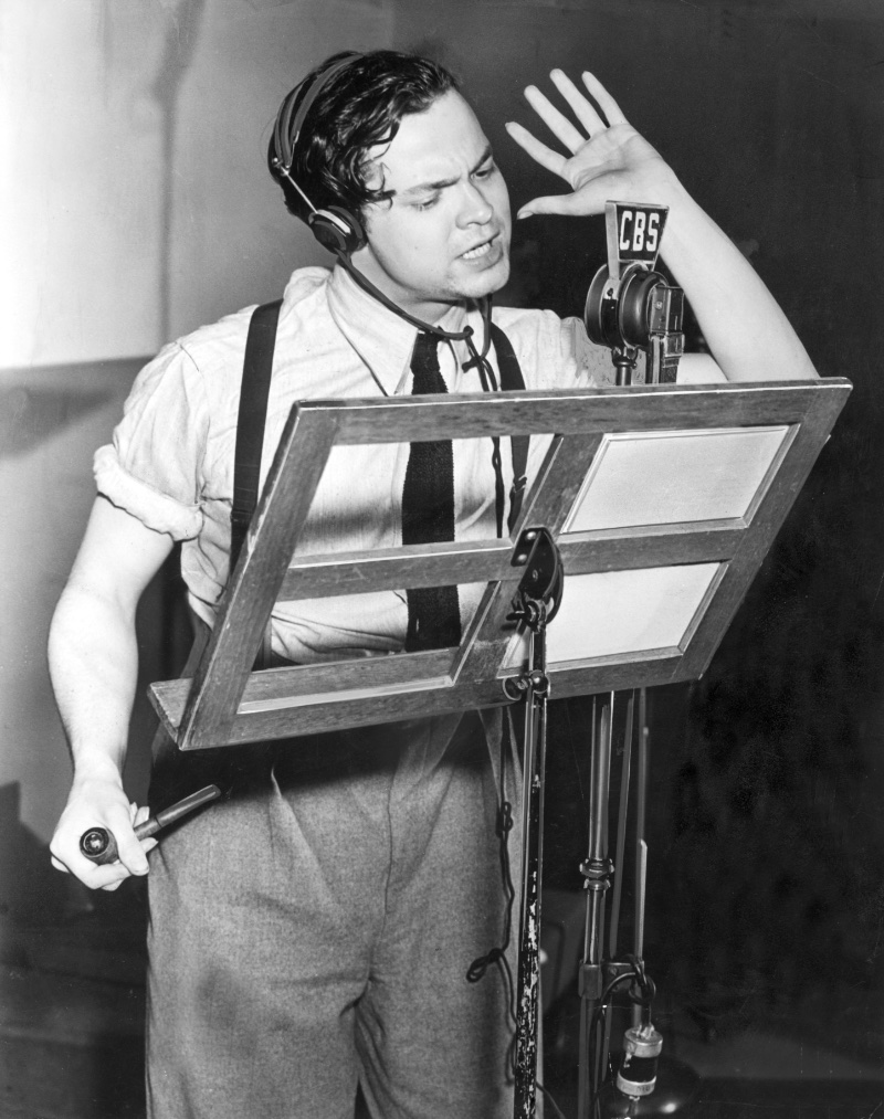 1930s Mens Fashion Orson Welles Studio 1939 Orson Welles dons suspenders and a tie with a shirt and pleated trousers at a 1939 CBS studio appearance to direct The Mercury Theatre on the Air.