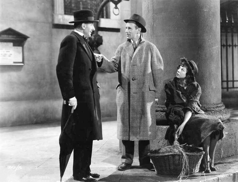 1930s Mens Fashion Pygmalion 1938 1930s men's fashion in a 1939 still of Scott Sunderland, Leslie Howard, and Wendy Hiller in Pygmalion.