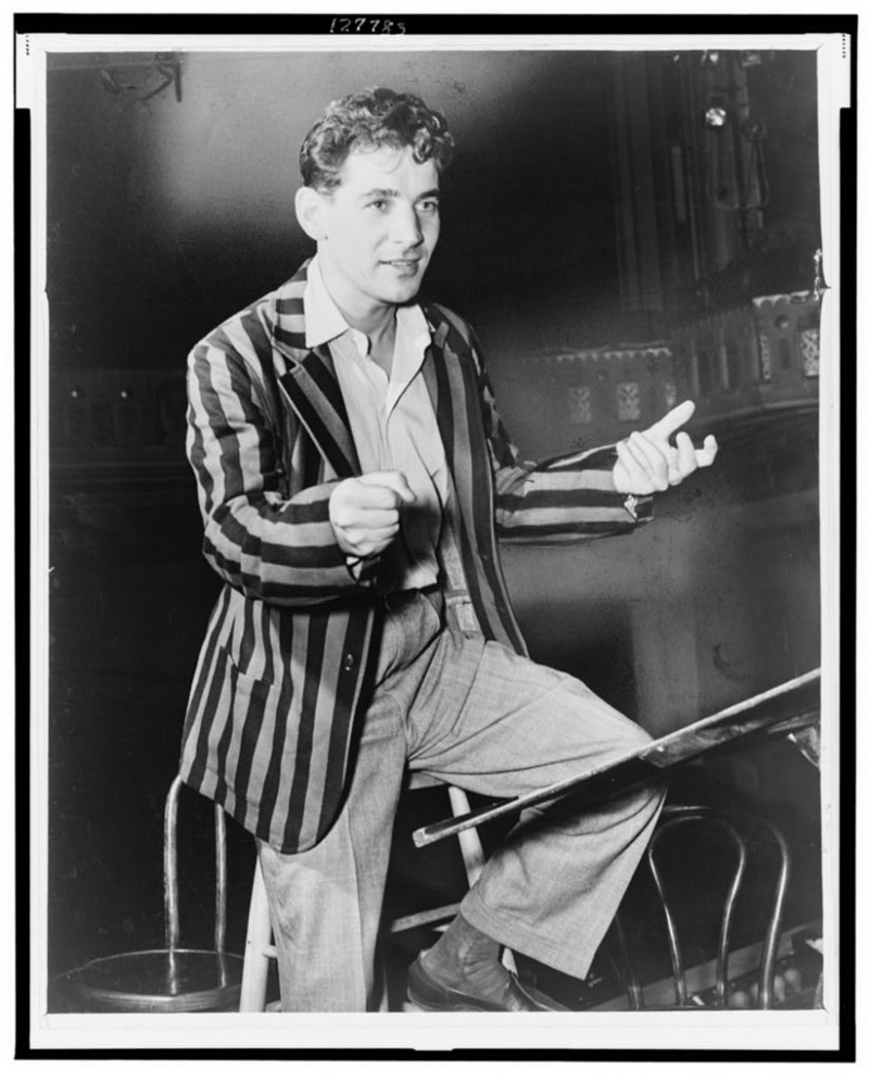 40s Fashion Men Leonard Bernstein Striped Sport Coat Trousers Conductor Leonard Bernstein circa 1945 wears a striped sport coat with wide-cut trousers.