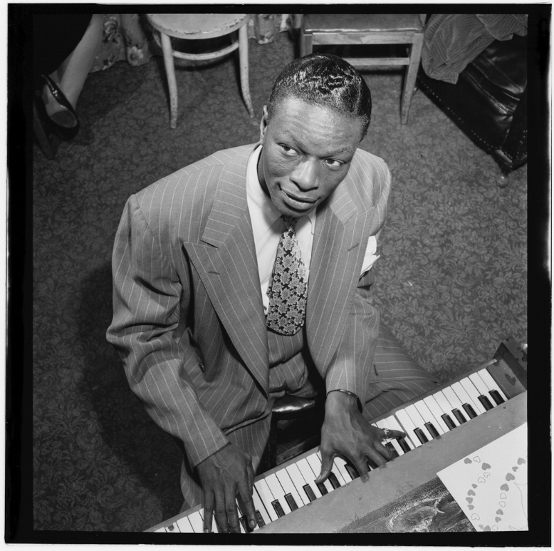 40s Fashion Men Nat King Cole Pinstripe Suit Printed Tie Nat King Cole in a pinstripe suit photographed in New York circa June 1947.