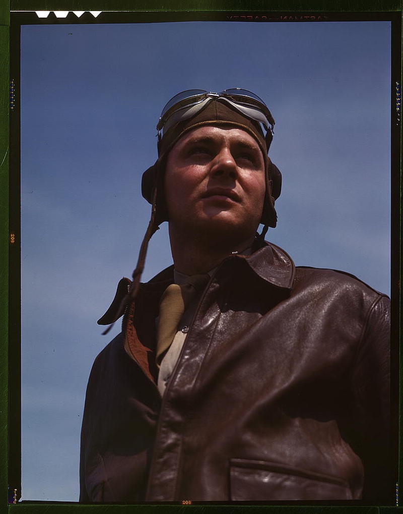 40s Fashion Men Pilot Bomber pilot in brown leather jacket circa 1942.