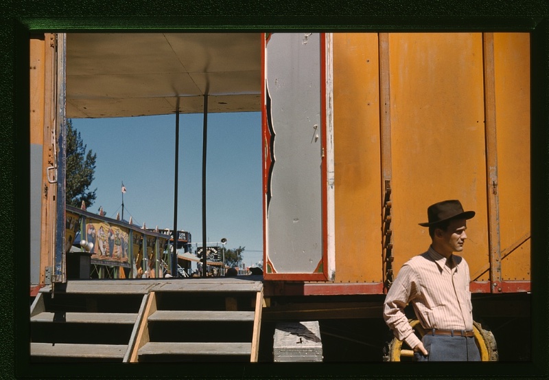 40s Fashion Men Striped Shirt Fedora Trousers A man wears a striped shirt with trousers, a slim leather belt, and fedora at the Vermont state fair circa September 1941.