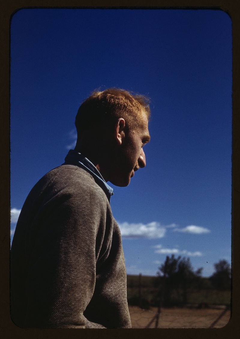 40s Fashion Men Sweater Photographed between 1941 and 1942, a man, possibly a farmer, wears a crewneck sweater.