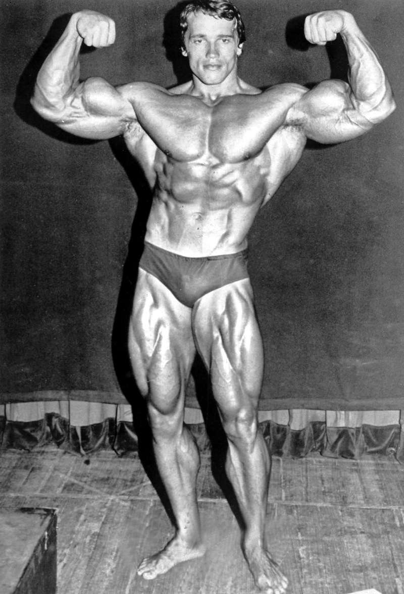 Arnold Schwarzenegger 1974 Shirtless Flexing Bodybuilding One of the prominent figures of 1970s bodybuilding, Arnold Schwarzenegger poses for a 1974 photo before defending the title for his fifth Mr. Olympia contest.