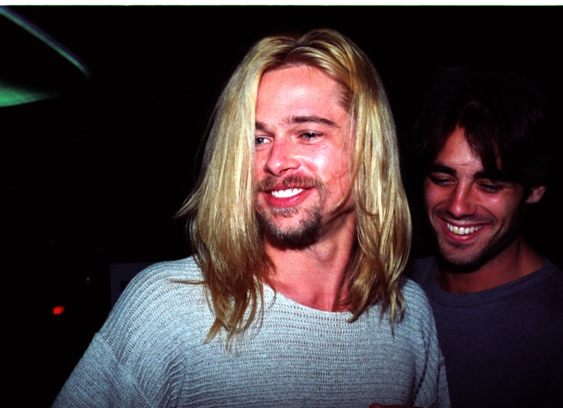 Brad Pitt 90s Mens Fashion Sweater Long Blond Hair Brad Pitt rocks his famous long blond hair as he leaves Roxbury nightclub in 1994.