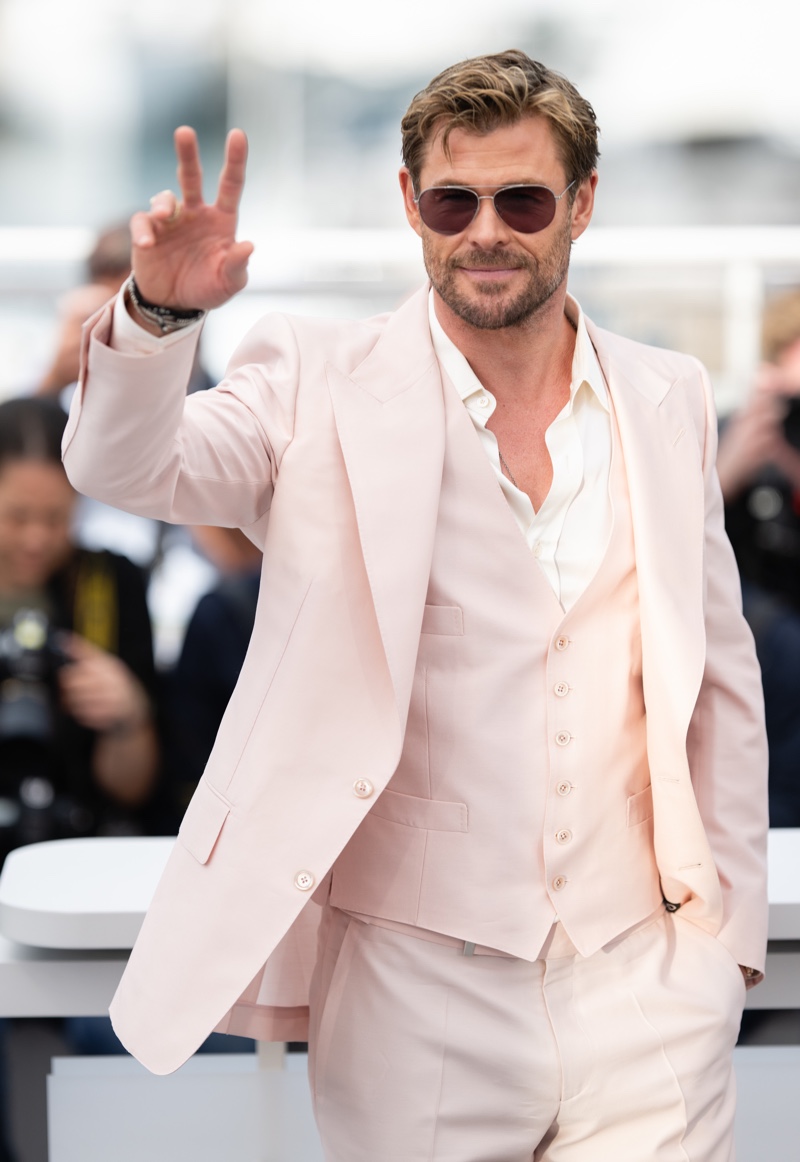 Chris Hemsworth 2024 Furiosa A Mad Max Saga Cannes Film Festival Tom Ford Photographed at the Cannes Film Festival, Chris Hemsworth dons a 3-piece Tom Ford suit in pink.