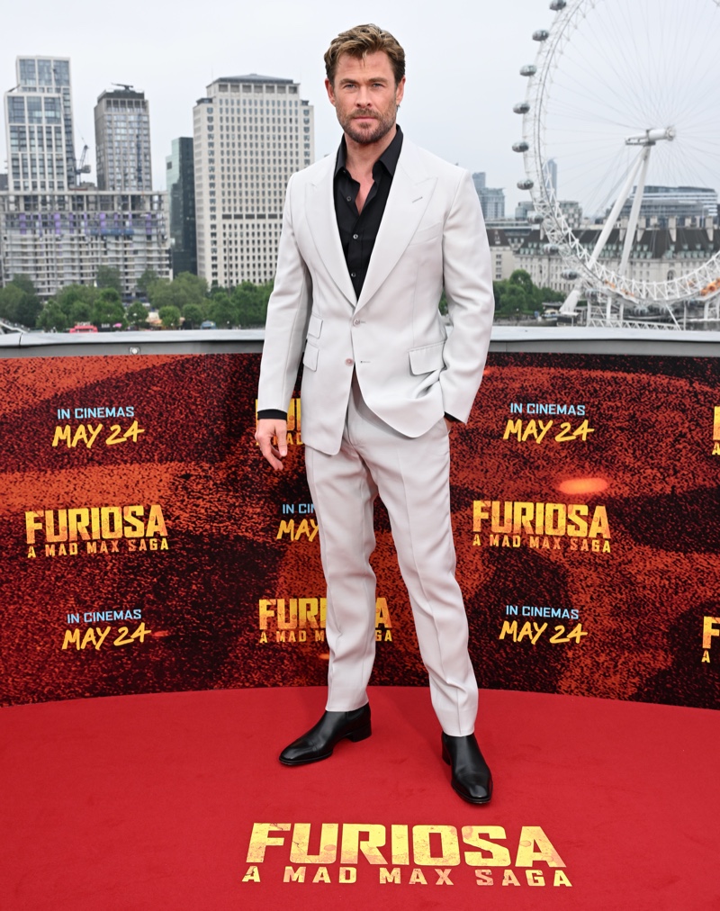 Chris Hemsworth 2024 Furiosa A Mad Max Saga London Photocall Tom Ford Chris Hemsworth wears a Tom Ford suit with leather boots to the Furiosa: A Mad Max Saga photocall in London.