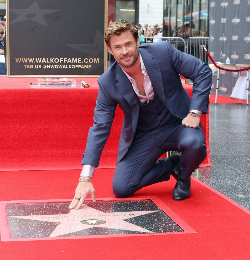 Chris Hemsworth 2024 Hollywood Walk of Fame Star Chris Hemsworth poses with his new star on the Hollywood Walk of Fame.