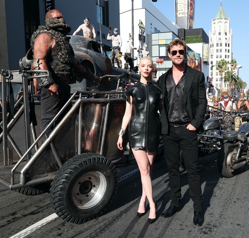 Furiosa Chris Hemsworth 2024 Cannes Anya Joy Taylor Hollywood Screening Coordinating in black outfits, Furiosa: A Mad Max Saga stars Anya Joy-Taylor and Chris Hemsworth appear at a Hollywood screening.