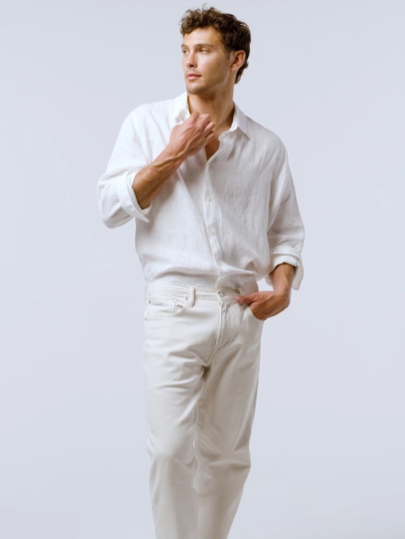 Gap Summer 2024 002 A smart summer vision, Cooper Koch sports Gap's long-sleeve linen shirt, ribbed tank, and straight jeans.