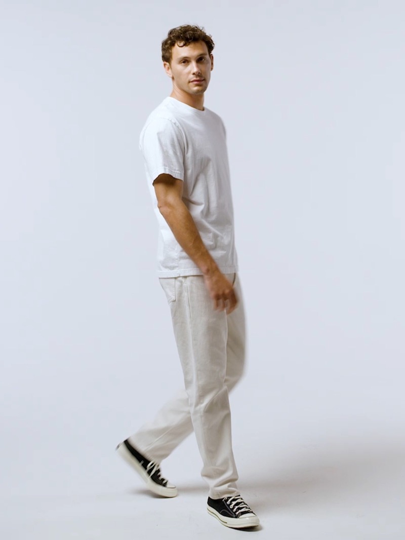 Gap Summer 2024 003 Embracing minimalist style, Cooper Koch wears a Gap Original tee and straight jeans.