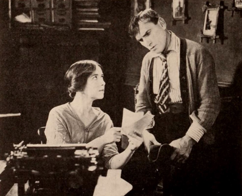 George Beban One Man in a Million Appearing alongside Helen Jerome Eddy in the 1921 film One Man in a Million, actor George Beban wears a striped shirt with a diagonal striped tie, and ribbed cardigan sweater.
