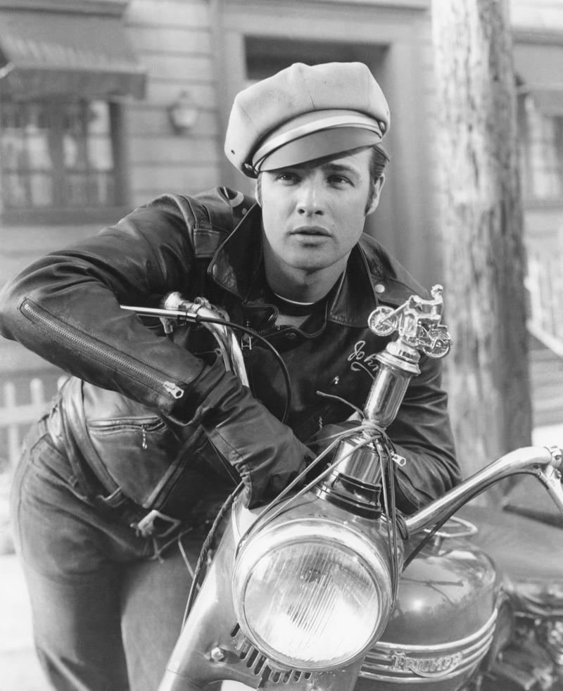 Marlon Brando The Wild One Leather Jacket Marlon Brando's portrayal of Johnny Strabler in The Wild One is iconic with his leather biker jacket, jeans, and biker cap.
