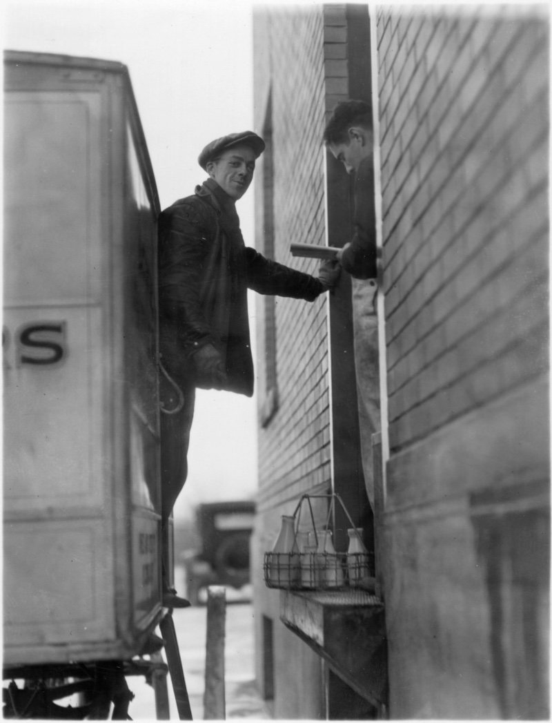 Milk Wagon Delivery Man 1920s Image of a 1920s milk wagon delivery man.