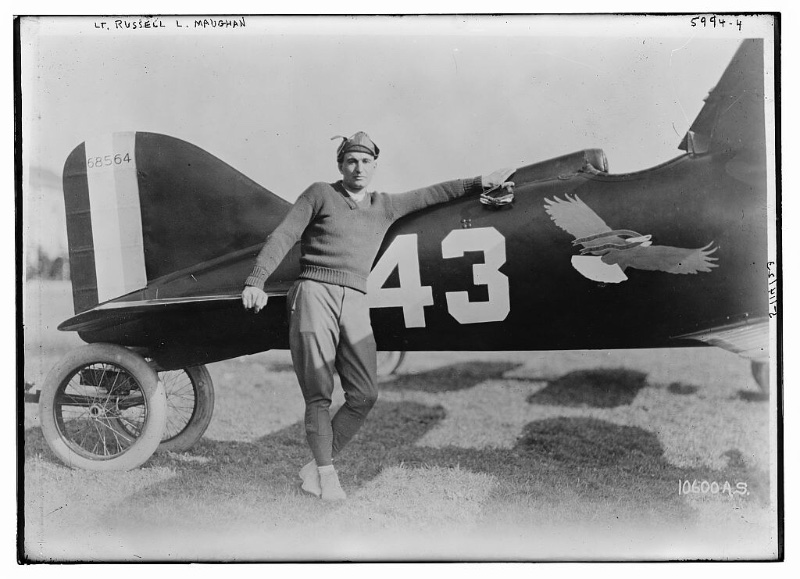 Russell Maughan 1920s Mens Style Sporting a casual sweater, Lt. Russell L. Maughan is photographed in the 1920s alongside a Curtiss R-6 Racer.