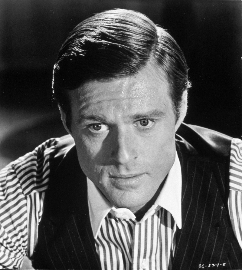 The Great Gatsby 1974 004 Hollywood legend Robert Redford wears a striped shirt with a pinstripe waistcoat as Jay Gatsby in The Great Gatsby (1974).