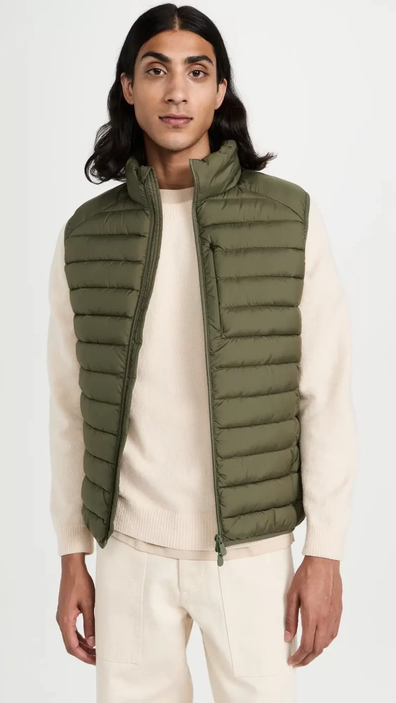 Save The Duck Green Vest Layer a sweater with a quilted vest like this Save The Duck style for an effortless winter look.